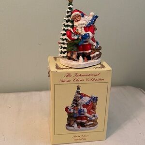 The international Santa Claus North Pole figurine